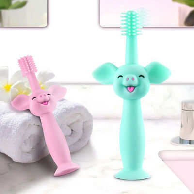 comprare Spazzolino da denti in silicone per uso alimentare a forma di maialino dei cartoni animati, giocattolo da dentizione per neonati, setole morbide, base a ventosa per l'igiene orale online manufacture