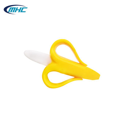 Lo spazzolino da denti molle Teether della banana di Teether del bambino non tossico del silicone ha personalizzato