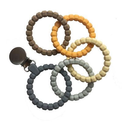Perle amichevoli di Teether Ring Shape Soft Teething Chew del bambino del silicone di Eco