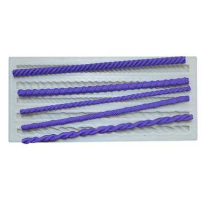 Il fondente bollente del mestiere della muffa del silicone degli utensili del dolce di forma della corda ha personalizzato