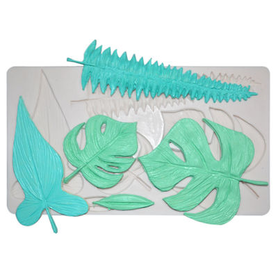 Gli utensili bollenti del silicone agglutinano la foglia dello strumento della decorazione modellano la decorazione del dolce del fondente delle muffe del silicio