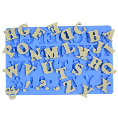 Gli utensili bollenti del silicone agglutinano le muffe bollenti del fondente delle lettere maiuscole della stuoia 3d del commestibile dello strumento