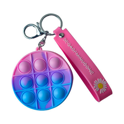 Borsa di irrequietezza di schiocco di spinta della borsa della moneta del silicone di distensione della tensione, giocattolo sensoriale di irrequietezza di colore di Candy